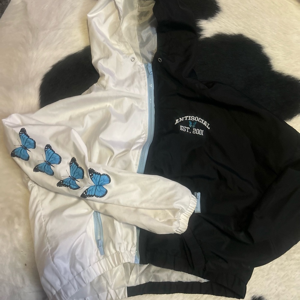 White and Black Jacket with Blue Butterfly Design